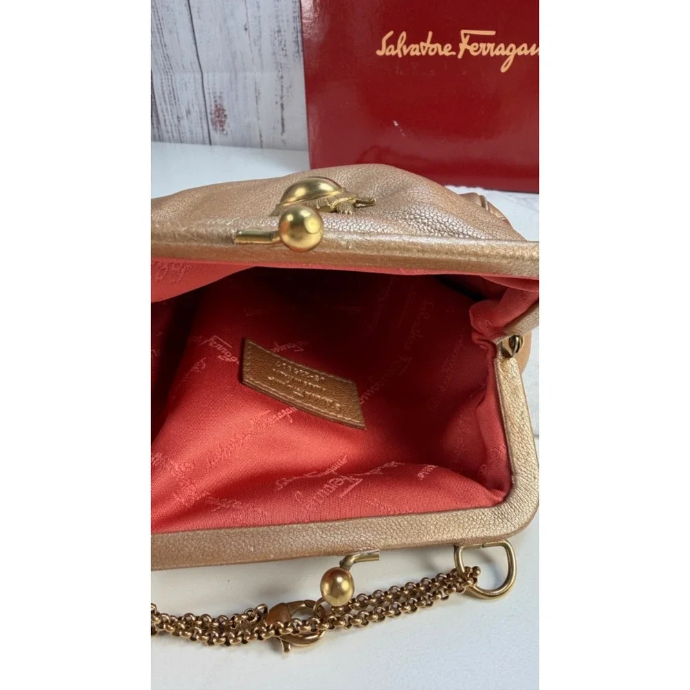 Auth Salvatore Ferragamo Gold Turtle clasp Metallic leather clutch w/dustbag